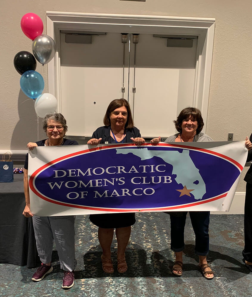 Stephanie, Jane, and Karen with DWC Marco Banner at DWCF Convention